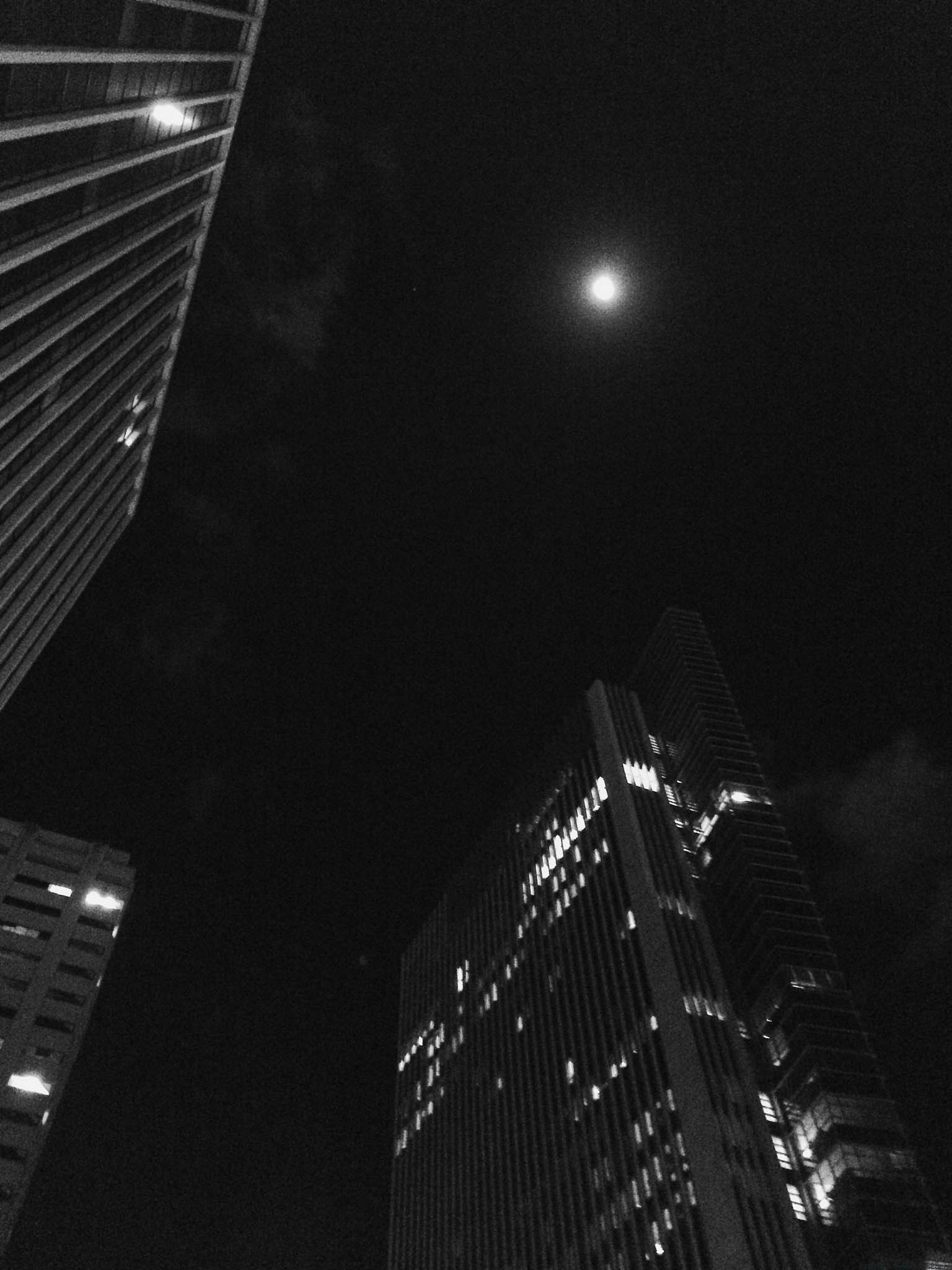 Full moon over Downtown Honolulu