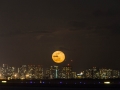 Honey moon rising over Waikiki