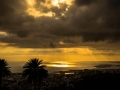 Sun shining through the clouds